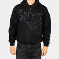 Zip Hoodie in Schwarz mit Herz Puff-Druck von Trevouse - Vorderansicht