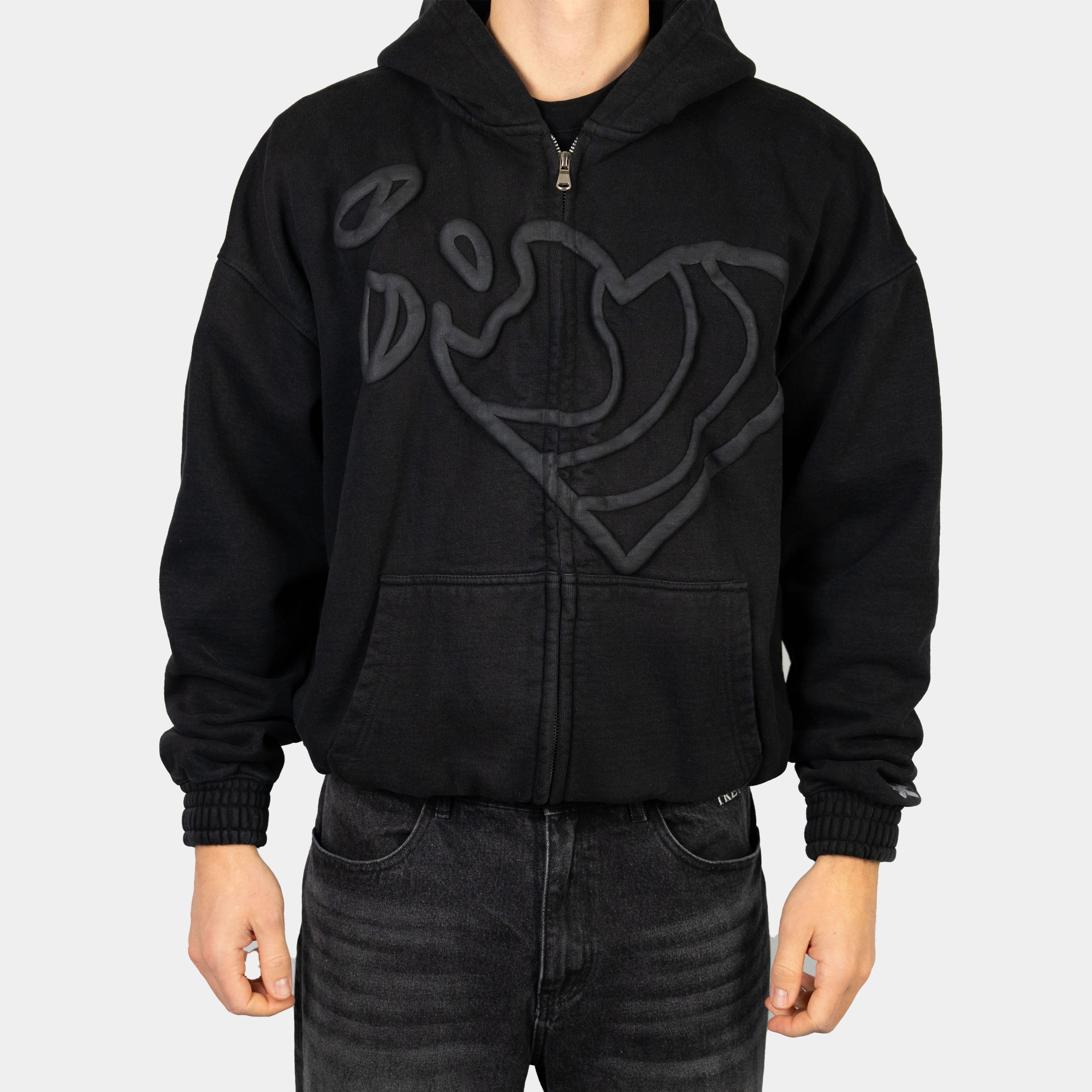 Zip Hoodie in Schwarz mit Herz Puff-Druck von Trevouse - Vorderansicht